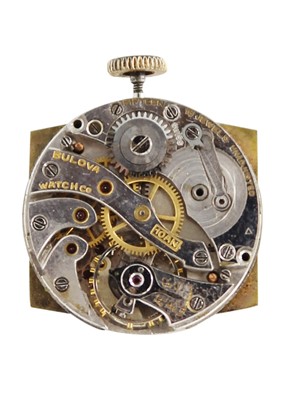 Lot 199 - A Bulova gold-plated manual wind gentleman's wristwatch and a travel clock.
