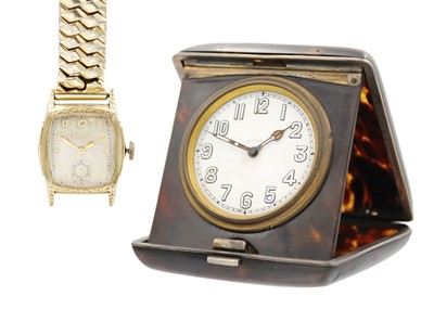 Lot 199 - A Bulova gold-plated manual wind gentleman's wristwatch and a travel clock.