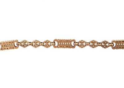 Lot 91 - A 9ct rose gold fancy link Albert watch chain with George III spade guinea gaming token fob.