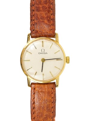 Lot 103 - OMEGA - A 9ct lady's manual wind wristwatch, ref. 1061.