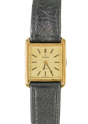 Lot 126 - OMEGA - A De Ville lady's gold-plated manual wind wristwatch.