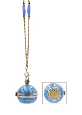 Lot 222 - A silver gilt and blue guilloche enamel 'ball' pendant watch.