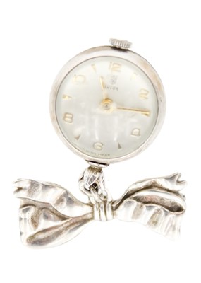 Lot 225 - A Tudor silver nurses 'ball' watch on a silver ribbon brooch and a 935 silver enamel fob watch.