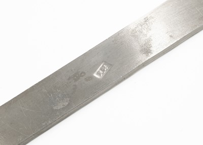 Lot 630 - A pair of Contemporary Chinese metal scroll weights.