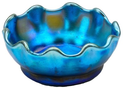 Lot 431 - A Tiffany Favrile iridescent blue glass salt or miniature bowl