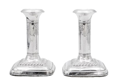 Lot 4 - An Edwardian pair of silver weighted candlesticks by Mark Ellis & Co.