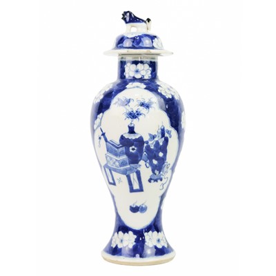 Lot 643 - A Chinese blue and white prunus blossom porcelain vase, late 19th century.