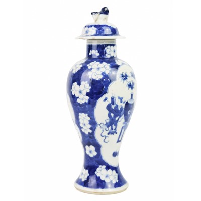 Lot 643 - A Chinese blue and white prunus blossom porcelain vase, late 19th century.