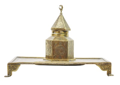 Lot 127 - An Islamic brass desk stand, 19th century.