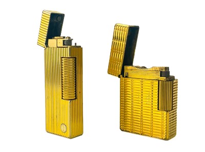 Lot 262 - A Dunhill gold plated pocket lighter.