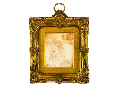 Lot 26 - An ormolu miniature frame.