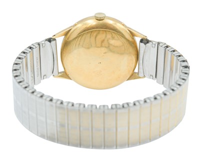 Lot 1033 - MOVADO - A 1950's 18ct calendar gentleman's manual wind wristwatch.