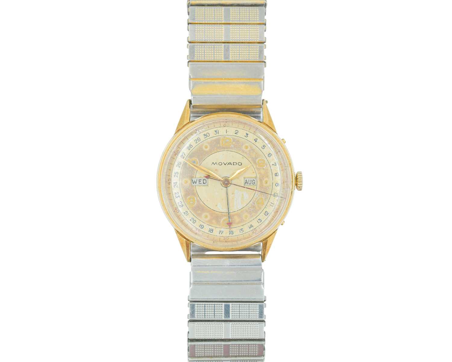 Lot 1033 - MOVADO - A 1950's 18ct calendar gentleman's manual wind wristwatch.