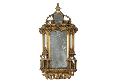 Lot 481 - A George III gilt gesso and carved wood wall mirror.
