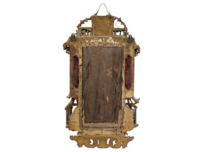 Lot 481 - A George III gilt gesso and carved wood wall mirror.