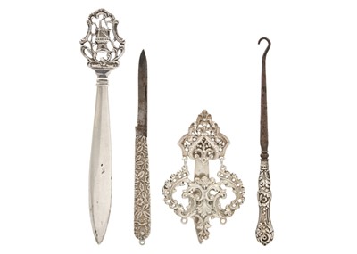 Lot 49 - A Victorian silver chatelaine clip, button hook, pen knife and letter opener.