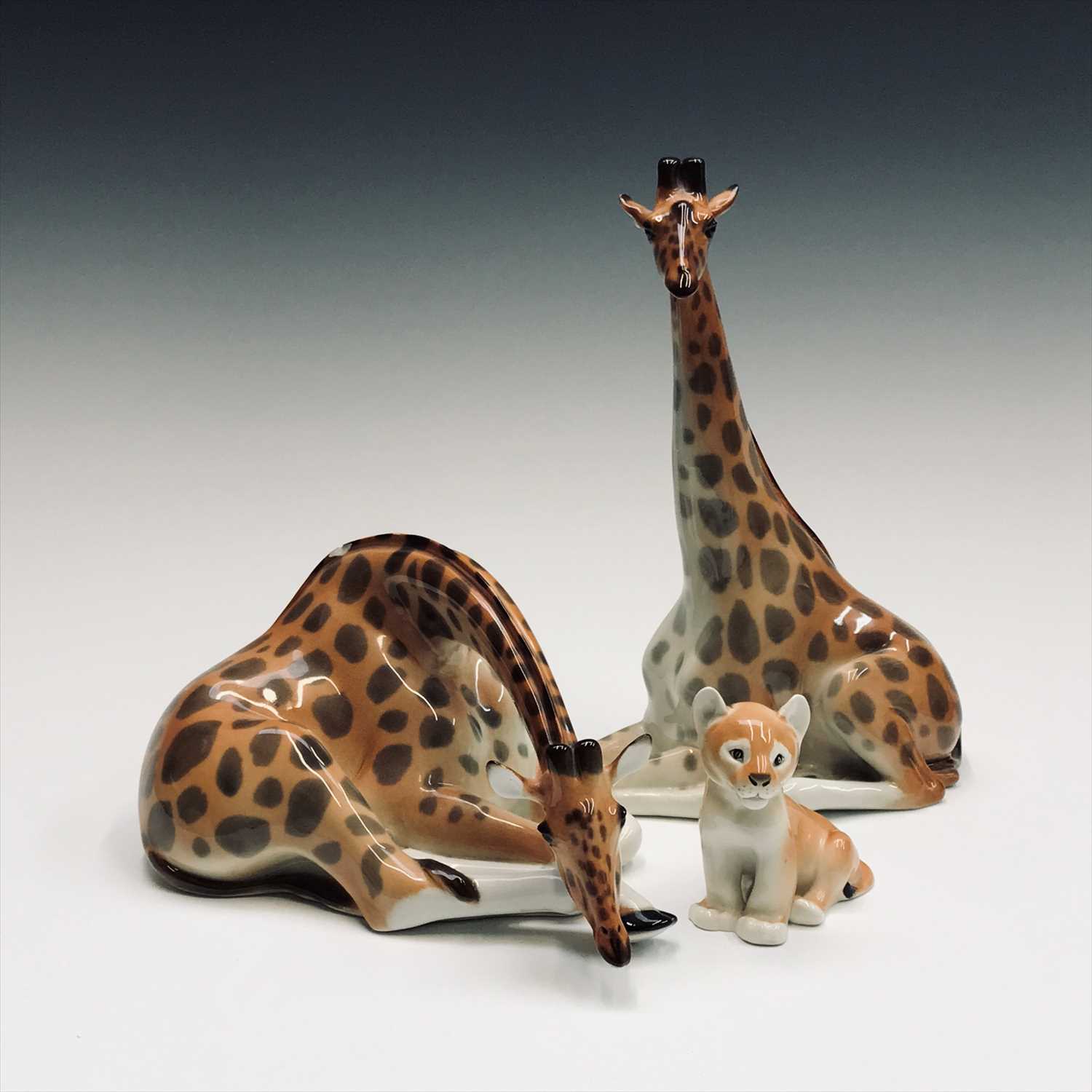 Lot 980 - Two Lomonosov USSR porcelain giraffes, tallest...