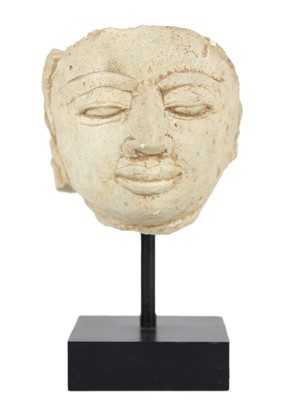 Lot 137 - A Gandhara type head fragment.