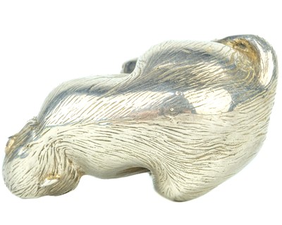 Lot 669 - A Japanese silver okimono of a macaque, signed.