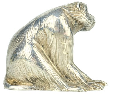 Lot 669 - A Japanese silver okimono of a macaque, signed.