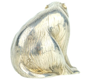 Lot 669 - A Japanese silver okimono of a macaque, signed.