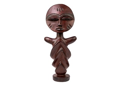 Lot 199 - A large Ashanti akua'ba fertility doll.