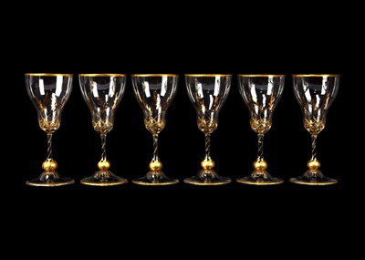 Lot 1530 - A set of six gilt decorated sherry glasses.