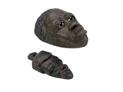 Lot 194 - An African carved wood carved mask.