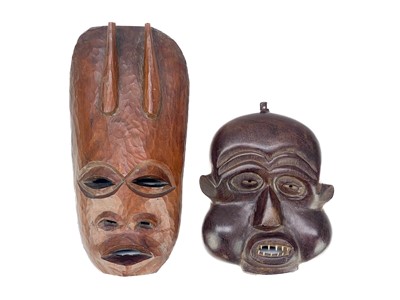 Lot 194 - An African carved wood carved mask.