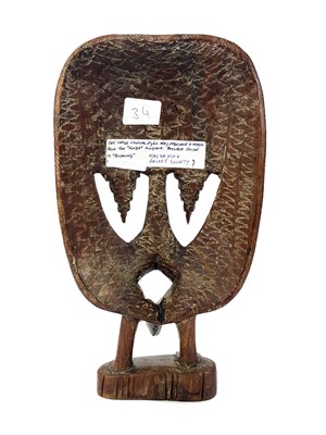 Lot 194 - An African carved wood carved mask.