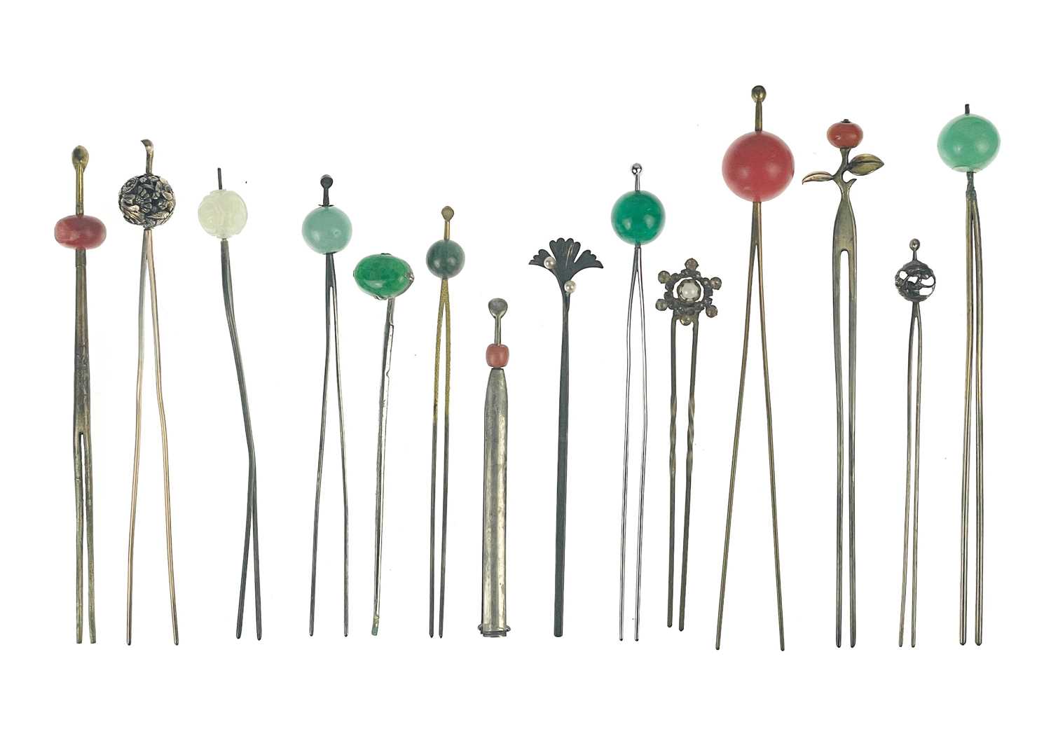 Lot 681 - Fourteen various Japanese metal, jade and hardstone kanzashi and kogai, 19th/20th century.