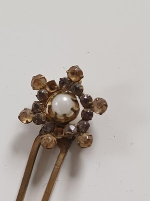Lot 681 - Fourteen various Japanese metal, jade and hardstone kanzashi and kogai, 19th/20th century.