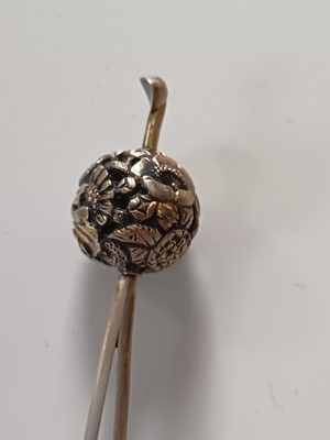 Lot 681 - Fourteen various Japanese metal, jade and hardstone kanzashi and kogai, 19th/20th century.