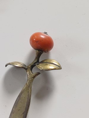 Lot 681 - Fourteen various Japanese metal, jade and hardstone kanzashi and kogai, 19th/20th century.