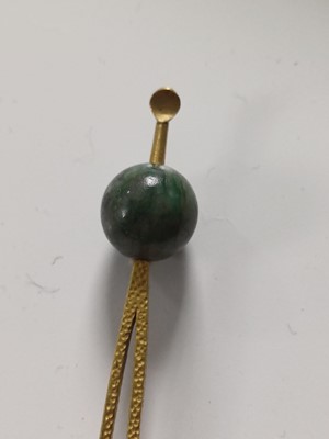 Lot 681 - Fourteen various Japanese metal, jade and hardstone kanzashi and kogai, 19th/20th century.