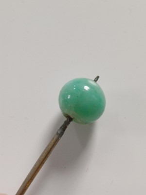 Lot 681 - Fourteen various Japanese metal, jade and hardstone kanzashi and kogai, 19th/20th century.