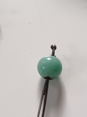 Lot 681 - Fourteen various Japanese metal, jade and hardstone kanzashi and kogai, 19th/20th century.