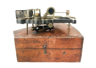 Lot 288 - An ebony and brass octant.