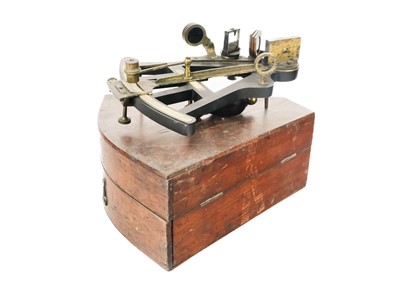 Lot 288 - An ebony and brass octant.