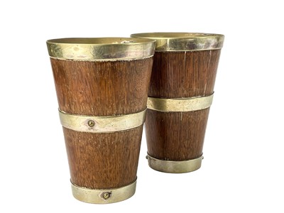 Lot 51 - An Edwardian oak coopered ale jug.