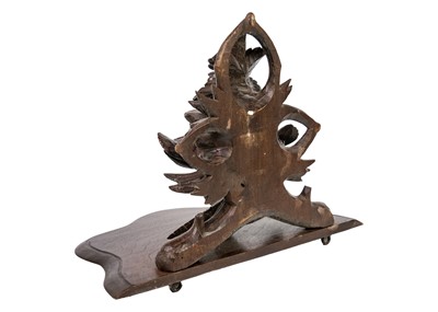 Lot 31 - A Black Forest carved wall bracket.