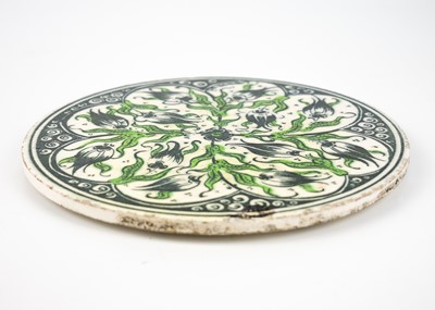Lot 116 - A Middle Eastern circular porcelain tile, late 19th/early 20th century.