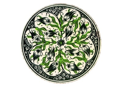Lot 141 - A Middle Eastern circular porcelain tile, late 19th/early 20th century.