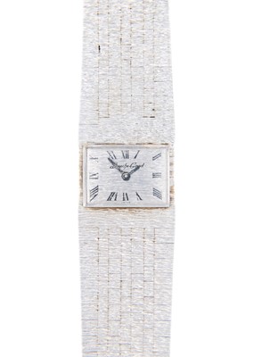 Lot 110 - BUECHE-GIROD - A 9ct white gold lady's manual wind bracelet wristwatch.
