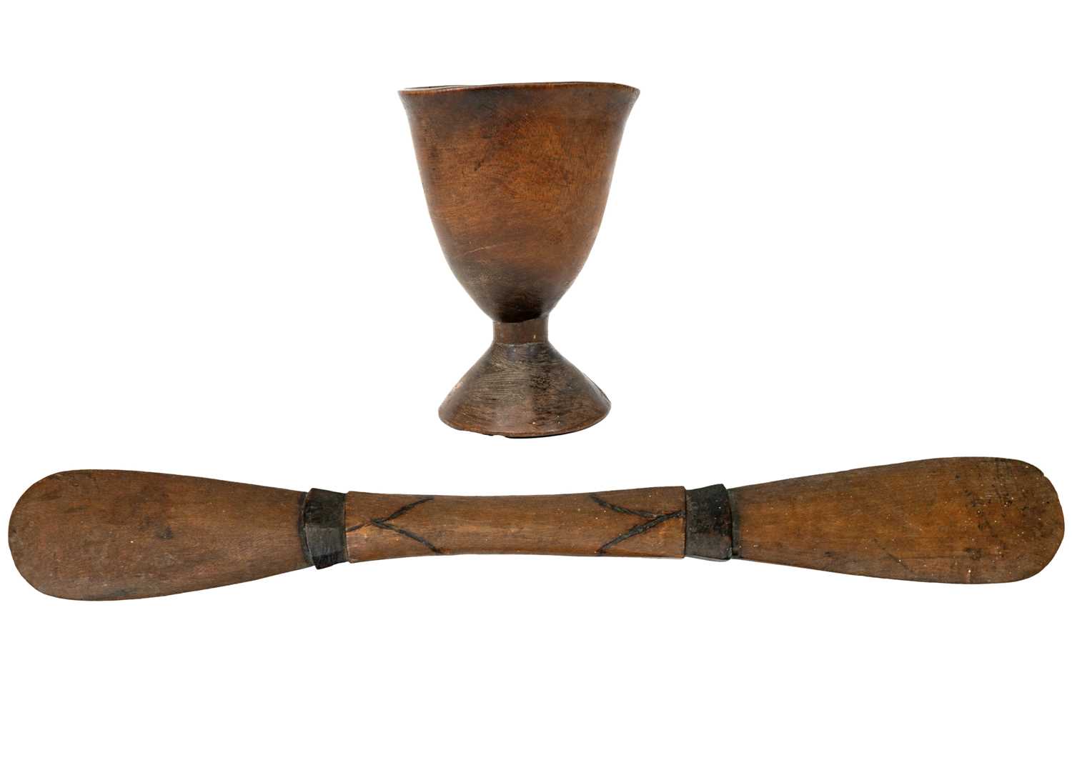 Lot 93 - An African carved chalice or libation cup.