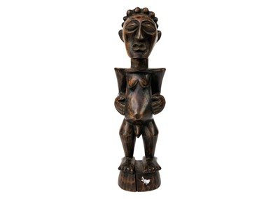 Lot 239 - A Songye power figure.