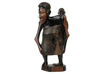 Lot 184 - An African hardwood carving group.