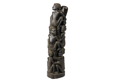 Lot 189 - An African hardwood carving group.