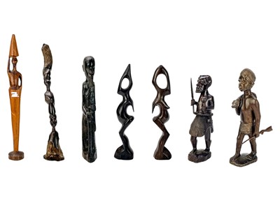 Lot 236 - An African hardwood carved figure of a hunter.