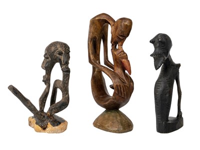 Lot 213 - An African carved abstract figure.